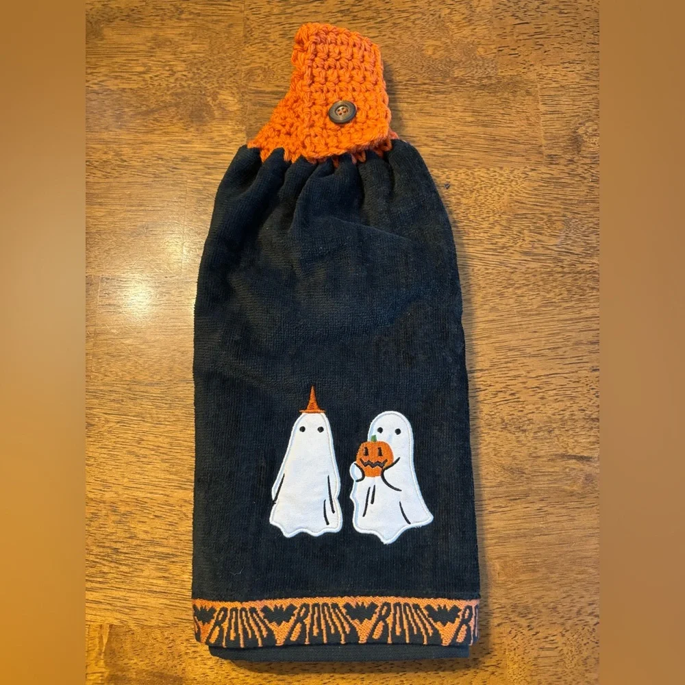 Hand crocheted full towel with embroidered ghosts